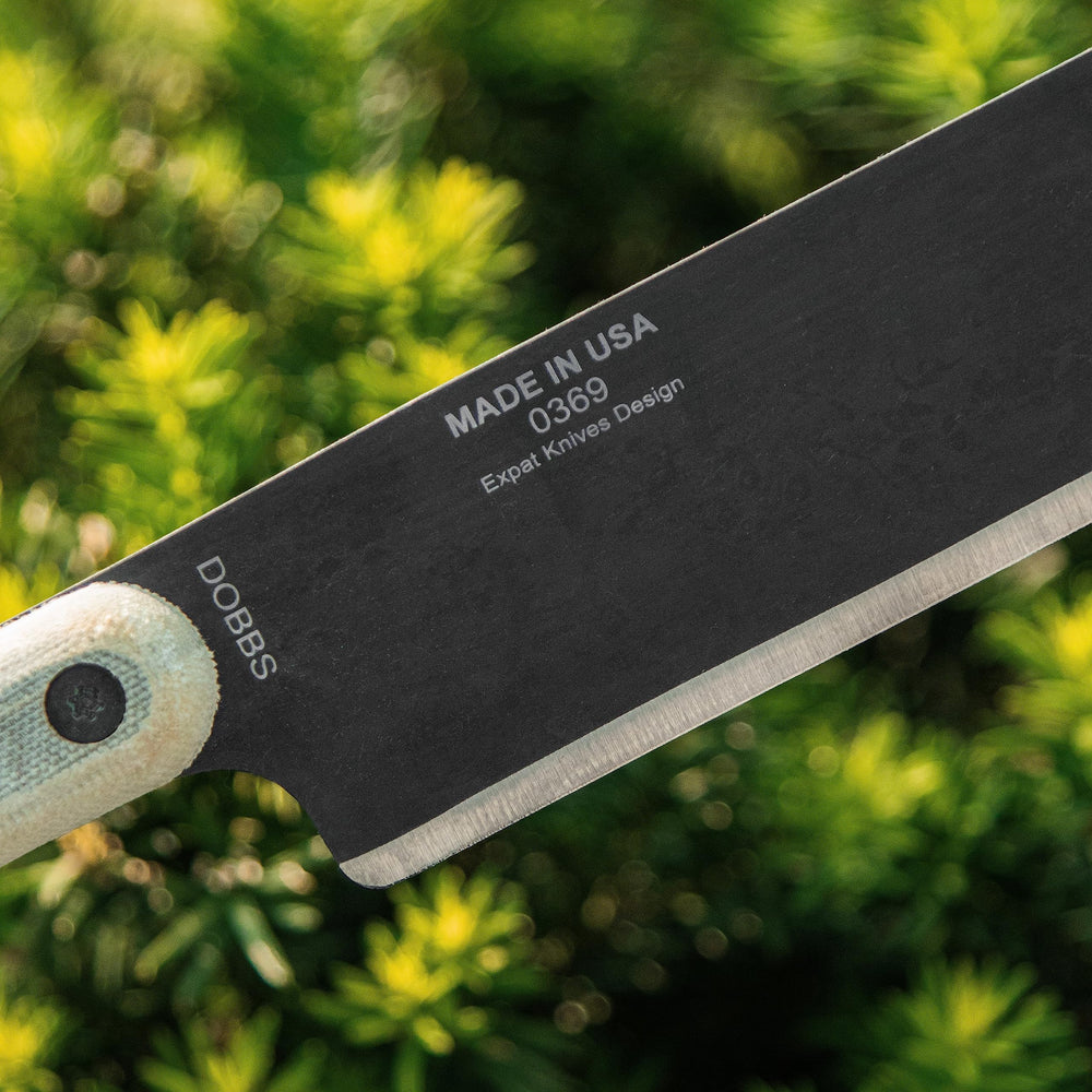 ESEE Libertariat blade spine with draw knife hole offering multi-use versatility