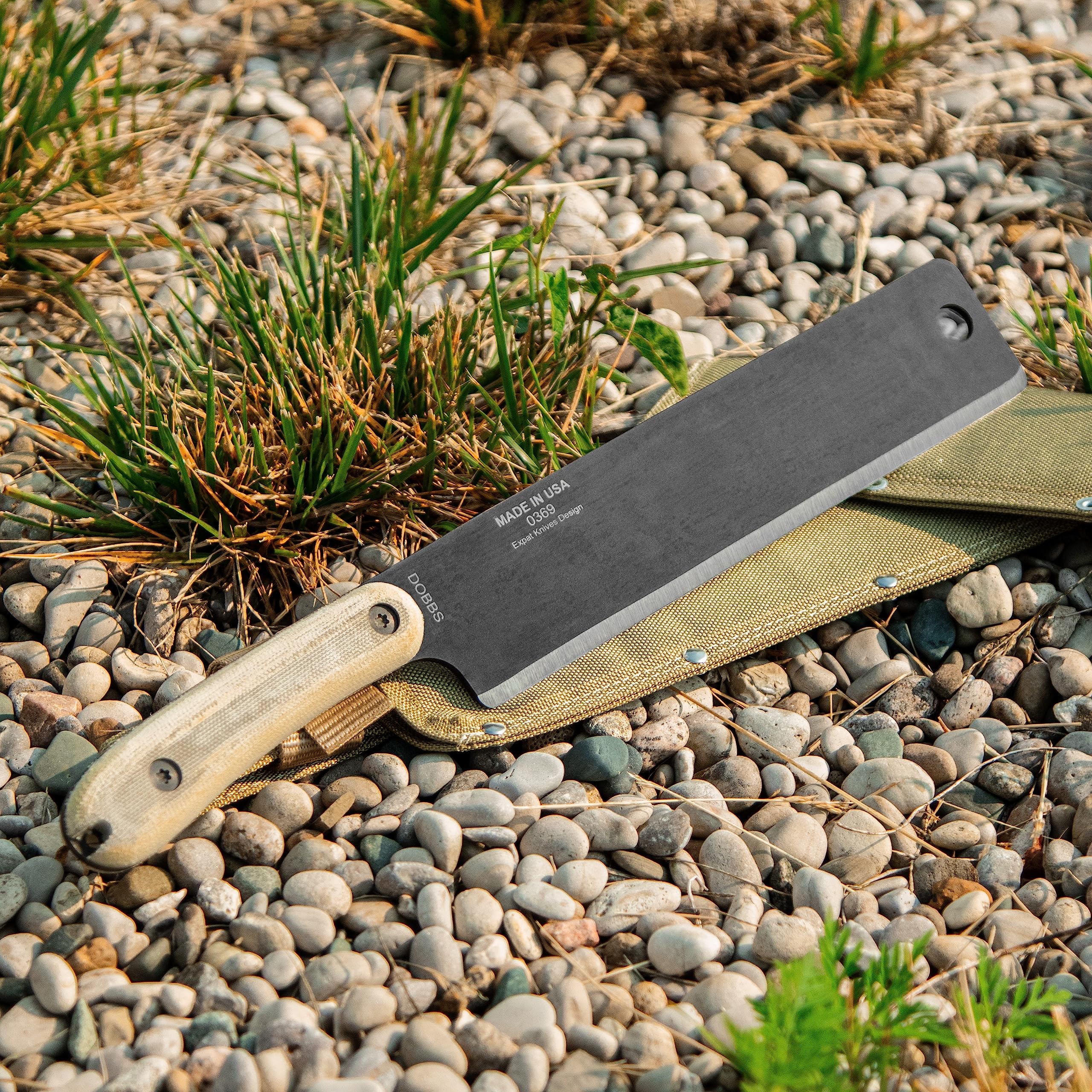 ESEE Libertariat held in hand for scale showing compact, portable design