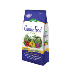 Espoma 6.75-pound bag beside garden tools illustrating size and convenience