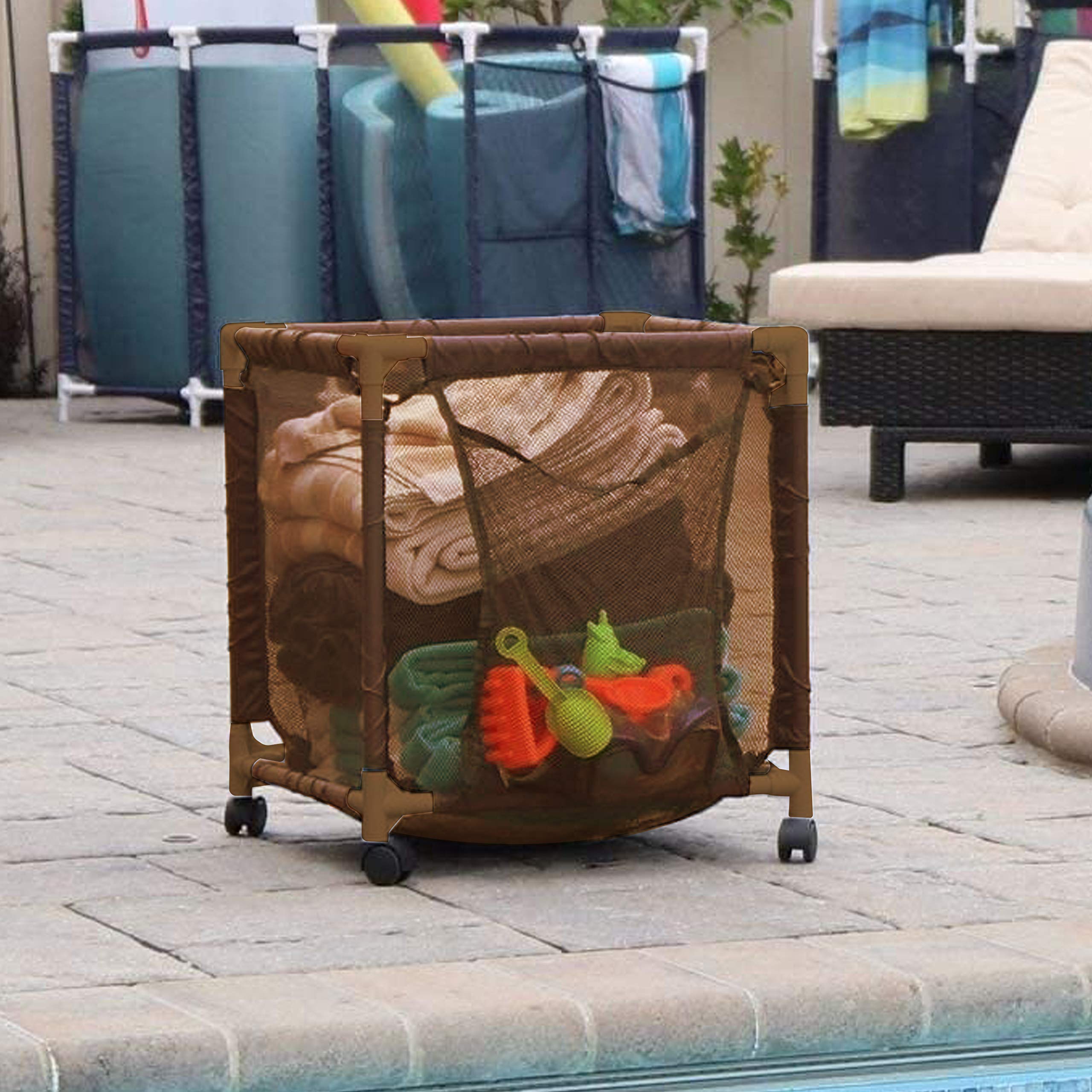 Essentially Yours size comparison beside folded towels showing compact 18x18x20 footprint