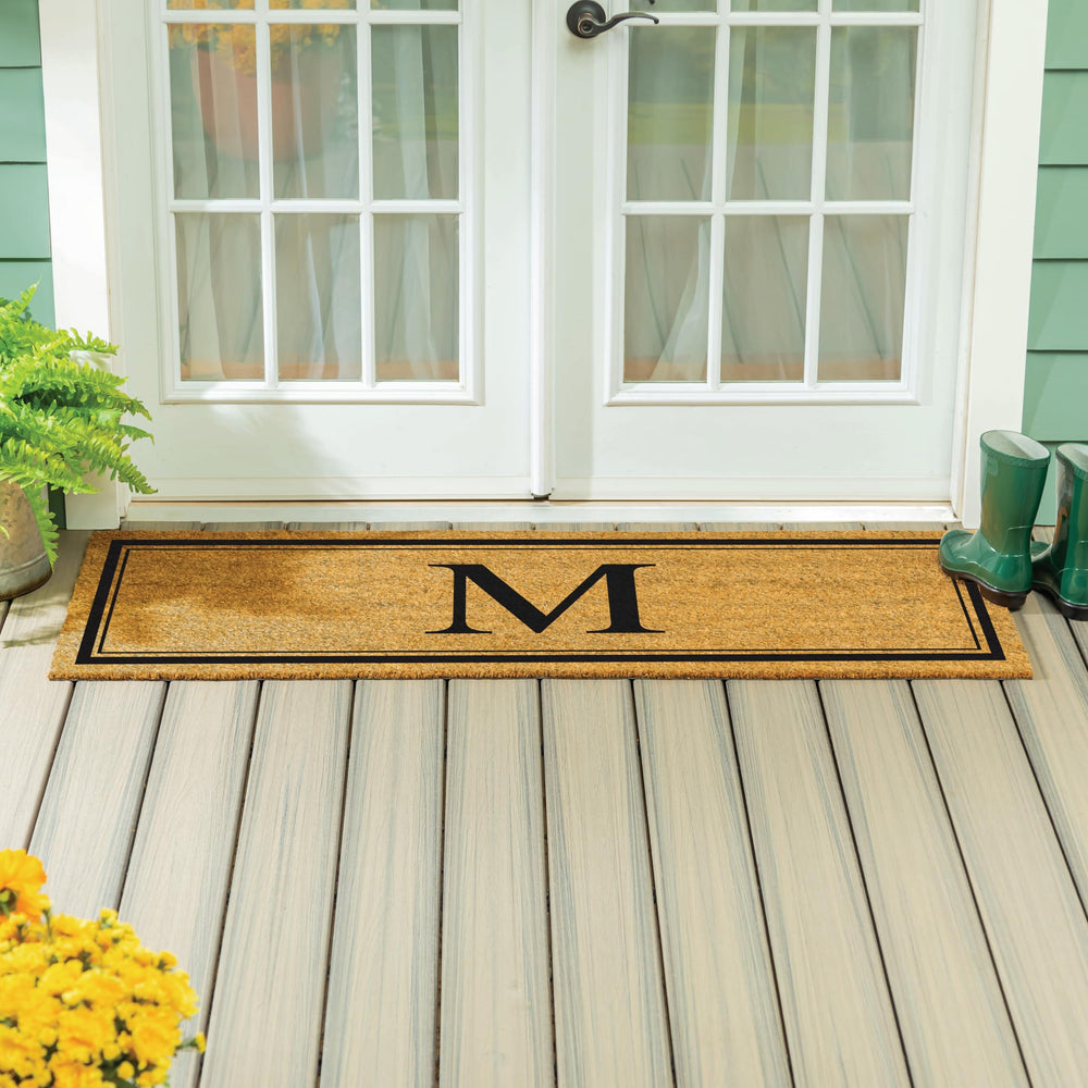 Evergreen Flag doormat under double doors showing perfect width fit