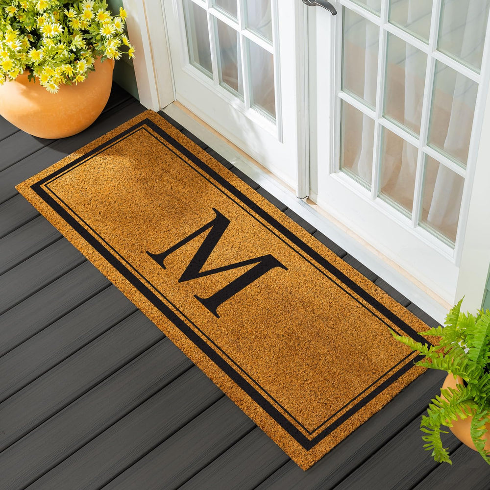 Evergreen Flag front view of monogram M doormat showing welcoming entry
