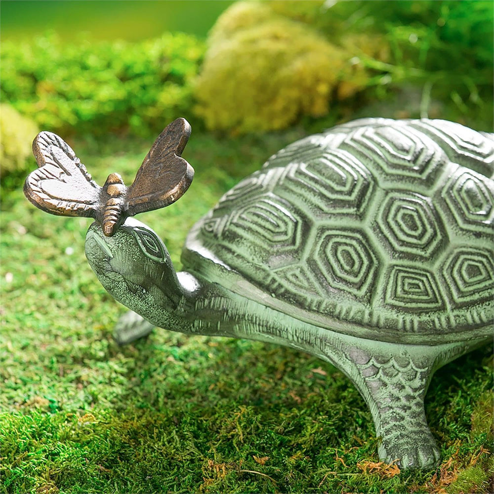 Evergreen Garden close-up of turtle shell and butterfly highlighting hand-carved detail
