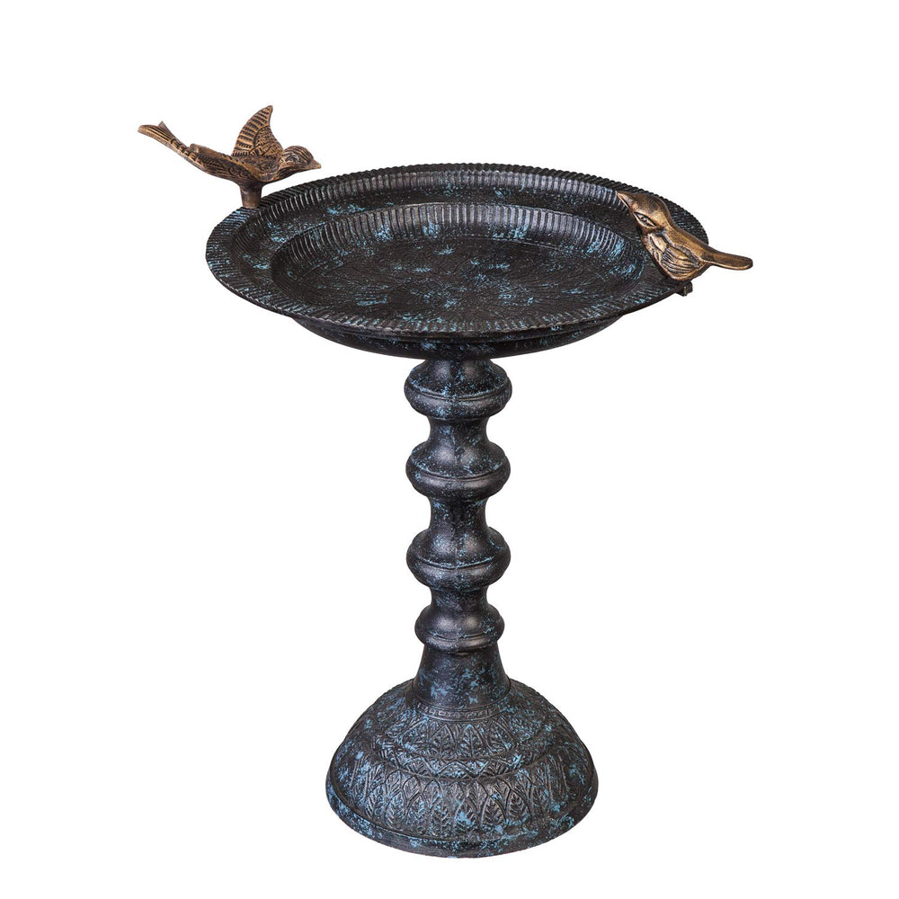 Evergreen Garden front view showing ornate cast iron bird bath and stand, durable focal point