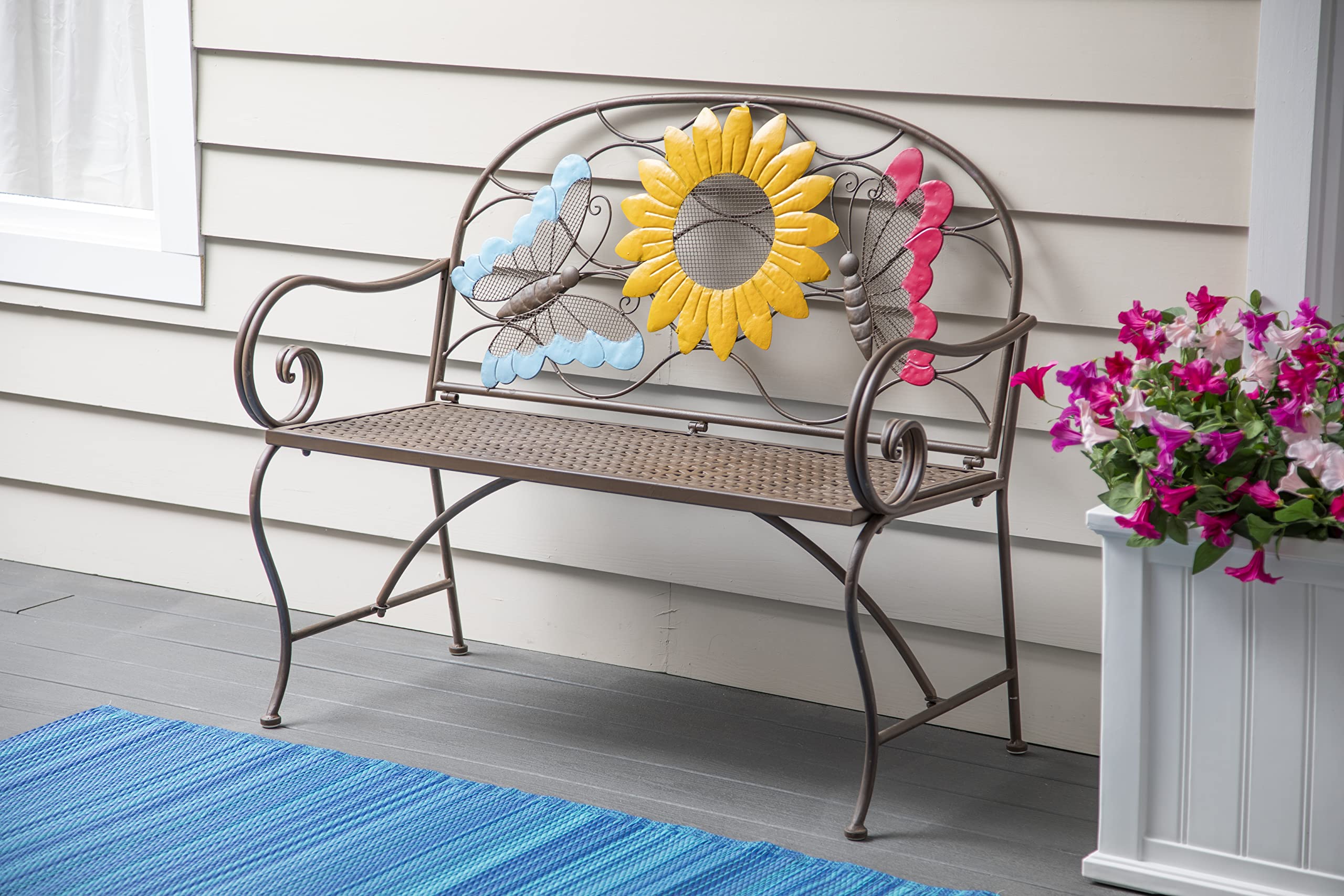 Evergreen Garden bench holding potted plants showcasing dual-use as plant stand