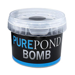 Evolution Aqua Pure Pond Bomb next to measuring cup showing dosing scale and ease of use