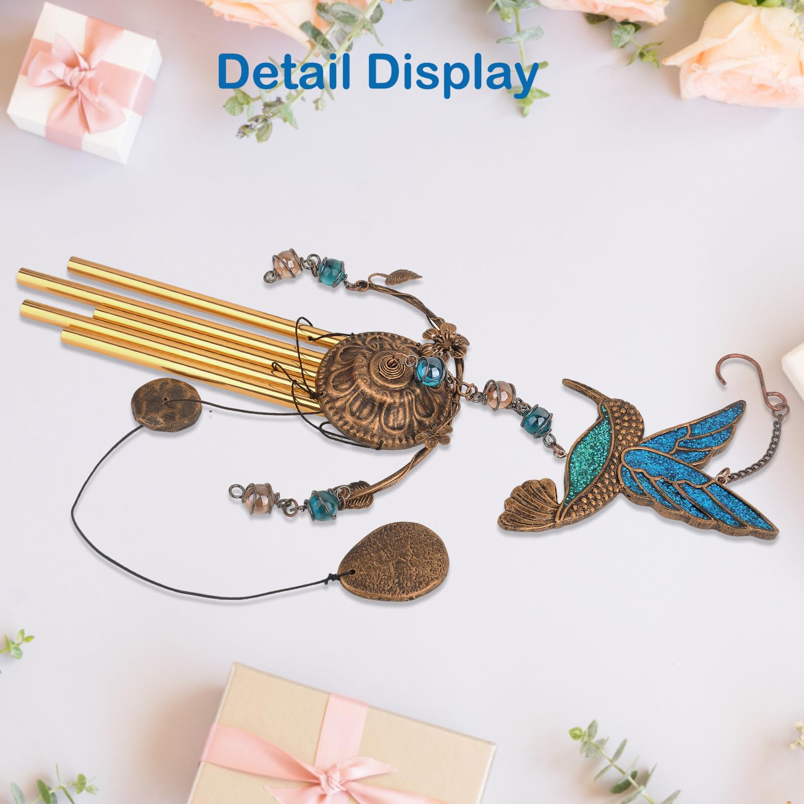 Exrisiry wind chime hanging from a patio rail enhancing outdoor ambiance
