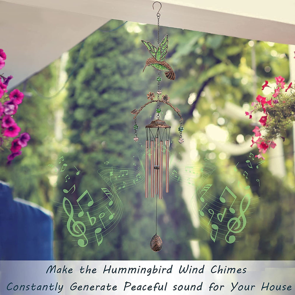 Exrisiry hummingbird wind chime hanging in garden providing relaxing ambiance and outdoor charm