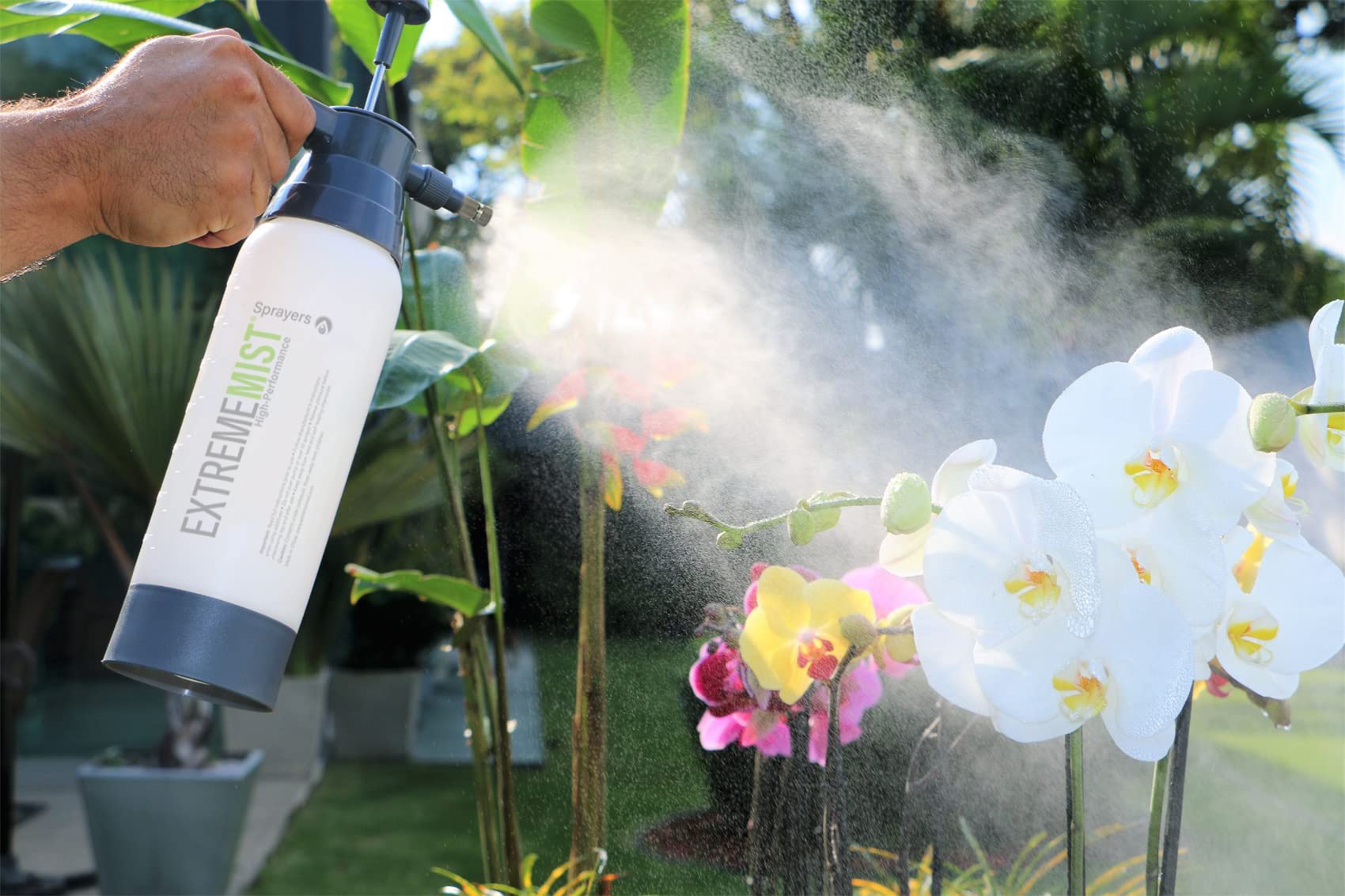 ExtremeMIST held in hand to demonstrate size and comfortable pump operation