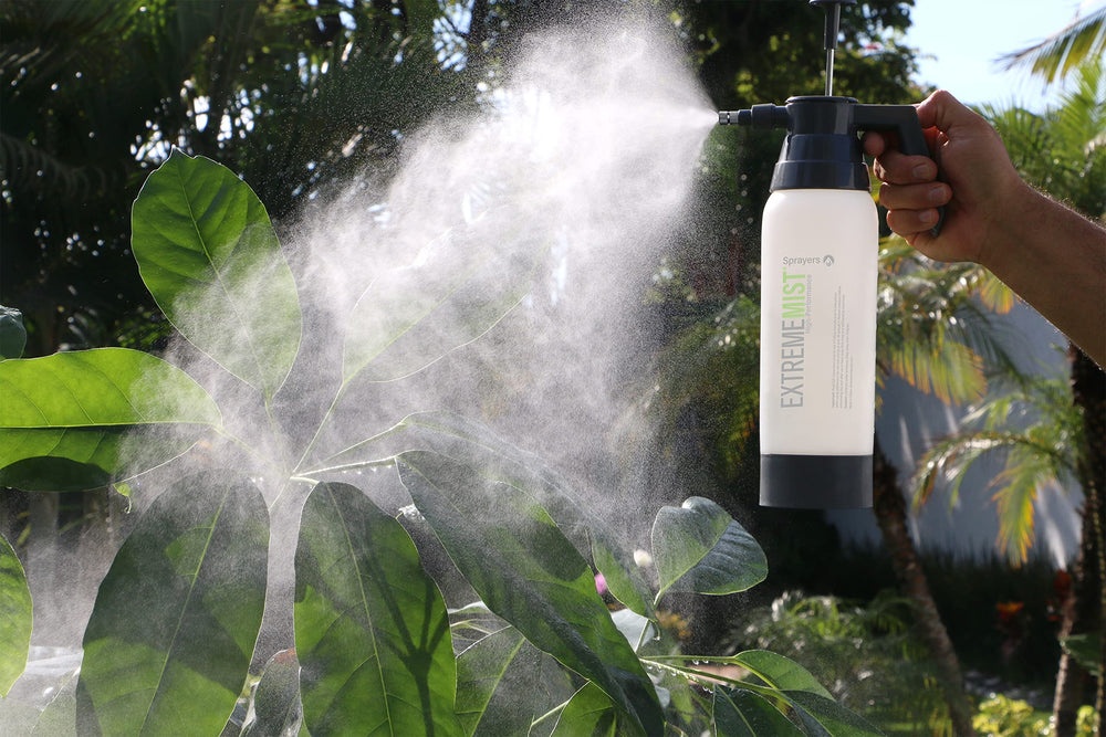 ExtremeMIST on a plant shelf in a home setting for stylish, reliable misting