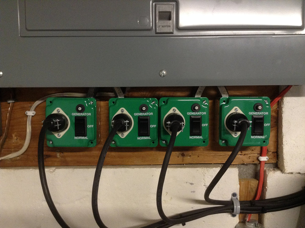 EZ Generator Switch held next to a hand to show compact size and easy mounting