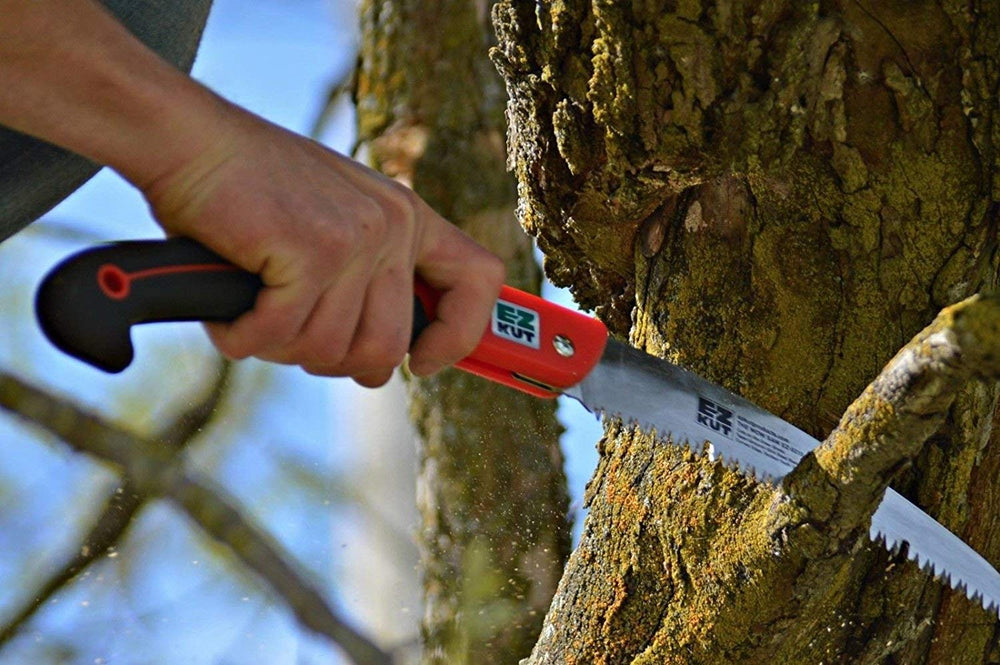 EZ Kut in-use pruning a branch demonstrating precise controlled cuts