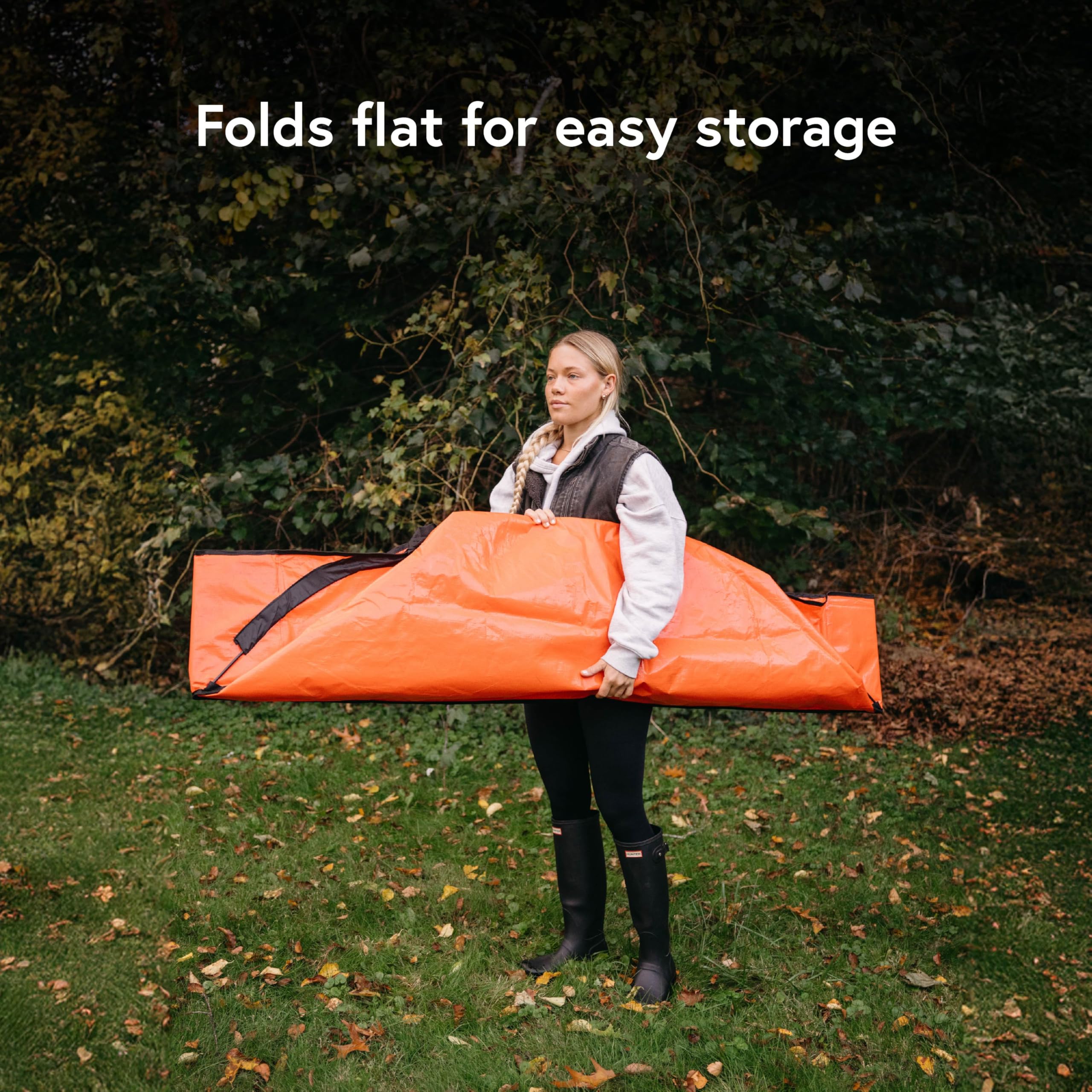 EZ Leaf Hauler in use while raking leaves to tarp for quick collection