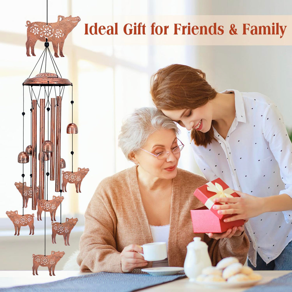 EZTZEN pig wind chime hanging on a porch creating calming outdoor ambiance and curb appeal