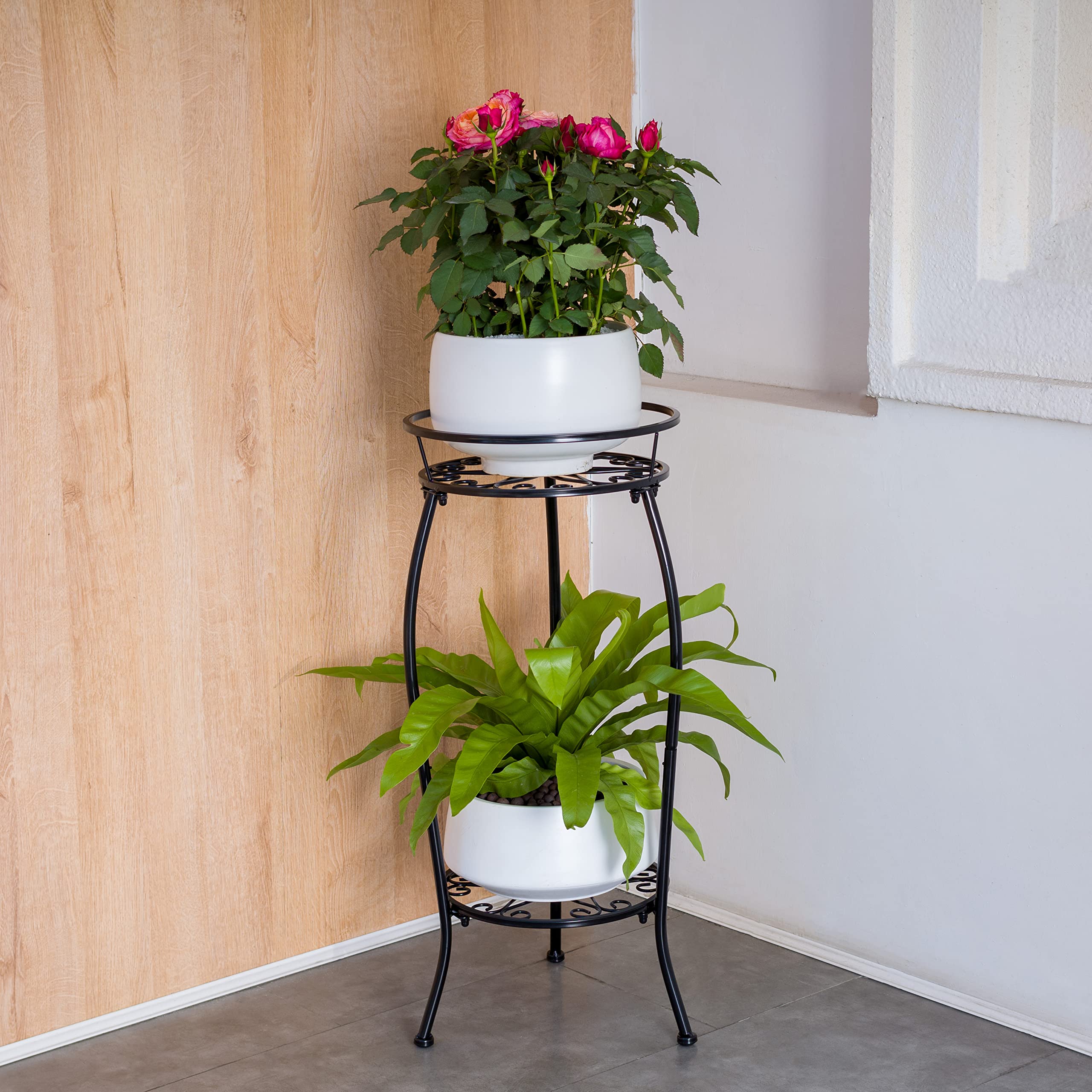 FaithLand hands assembling stand showing simple, tool-free setup advantage