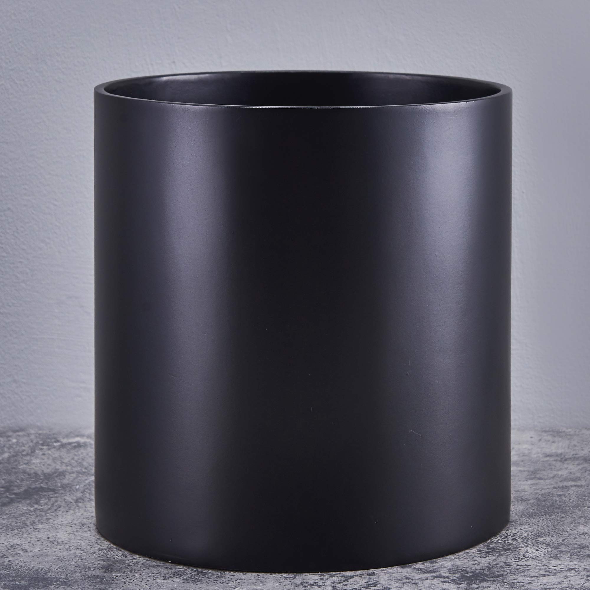 FaithLand planter front view showing matte black finish and clean cylinder shape, stylish display