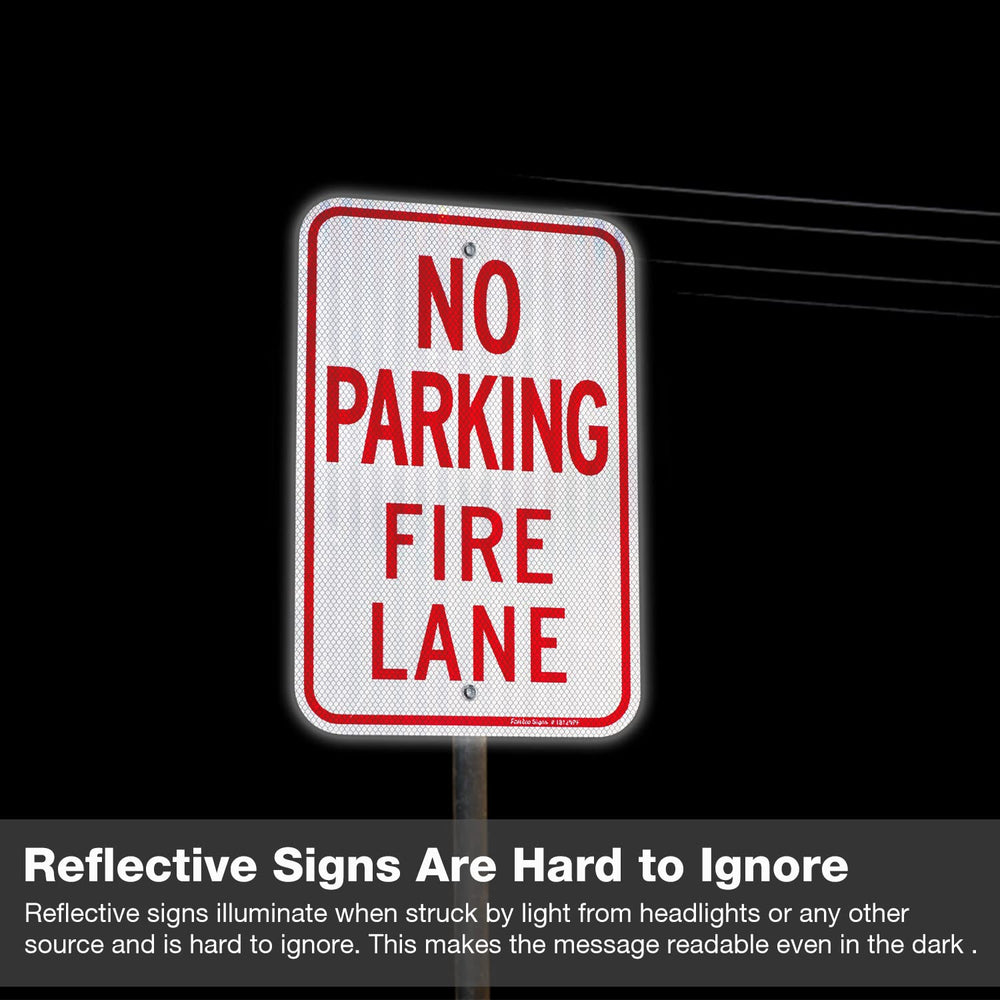 Faittoo sign on gate illustrating clear marking near parked cars