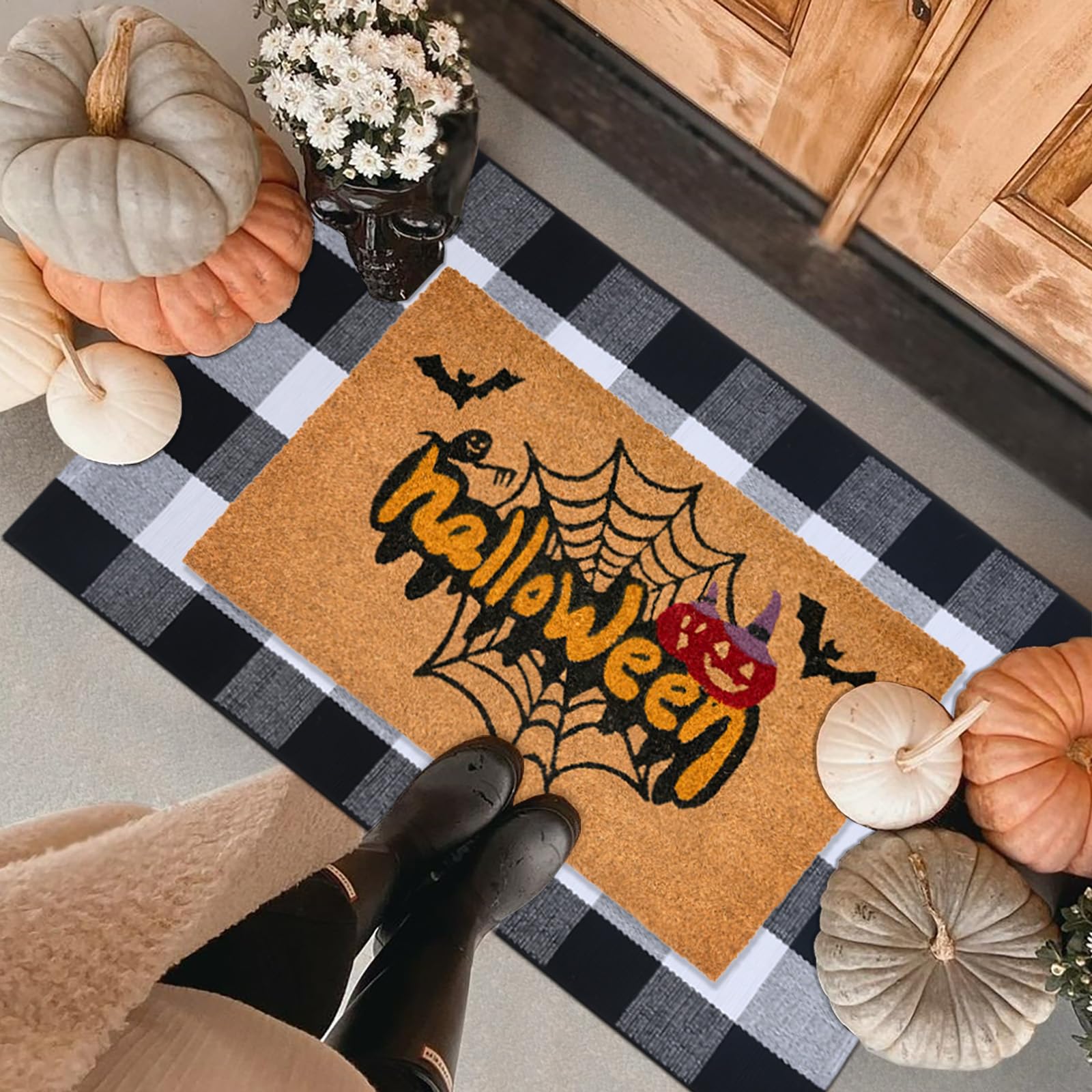 Fallovea front porch staged entryway showing festive welcome set and curb appeal