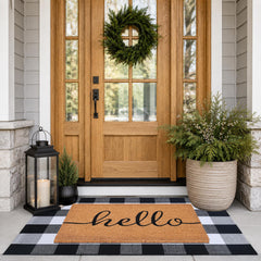 Fallovea doormat and plaid rug on porch showing inviting entry benefit