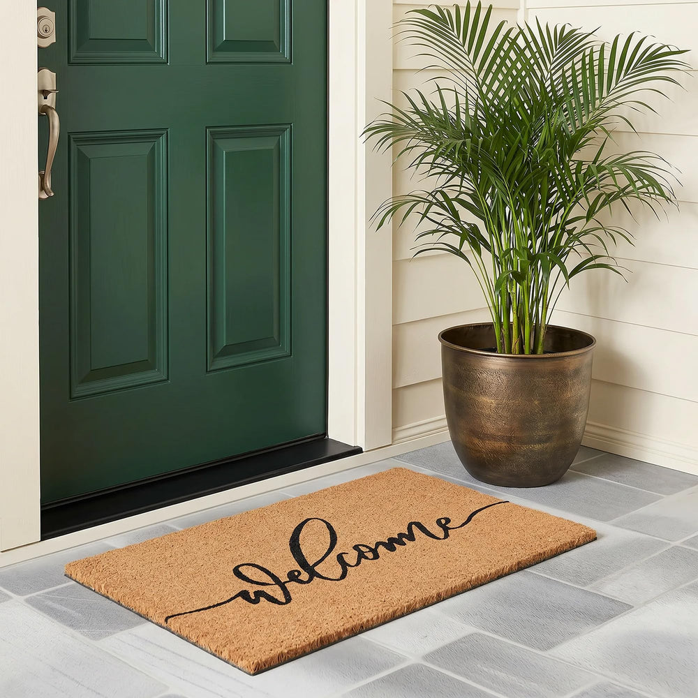 Fallovea mat in use on porch stopping debris and protecting floor