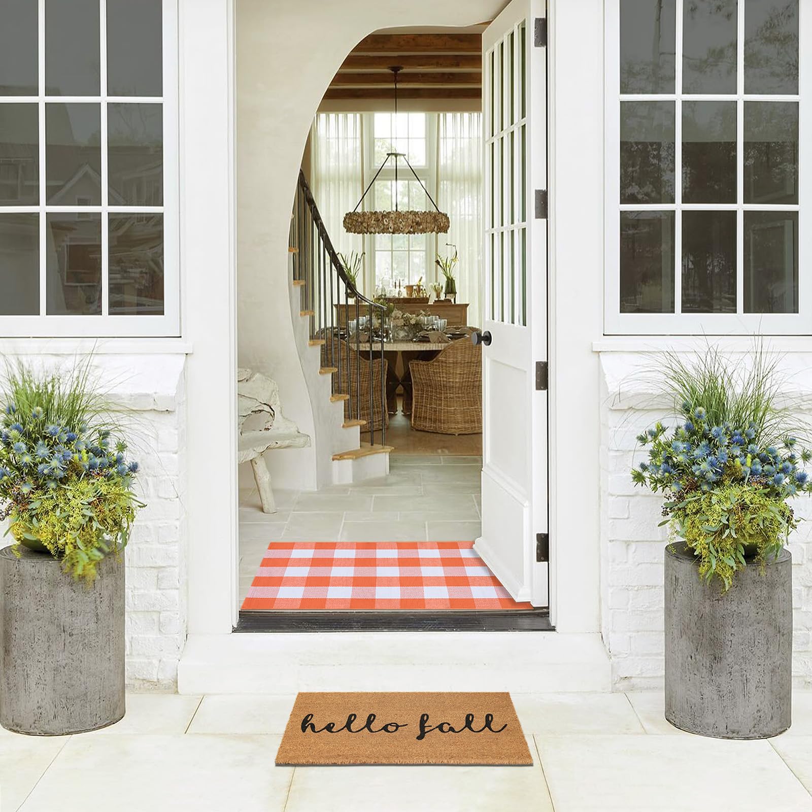 Fallovea porch scene with pumpkins demonstrating seasonal styling and inviting curb appeal