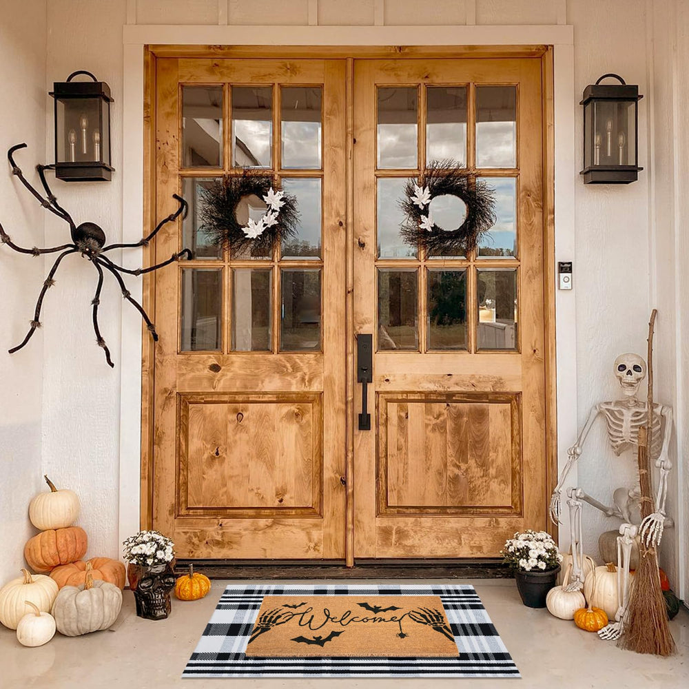 Fallovea styled porch with pumpkins and mats, shows easy seasonal décor coordination