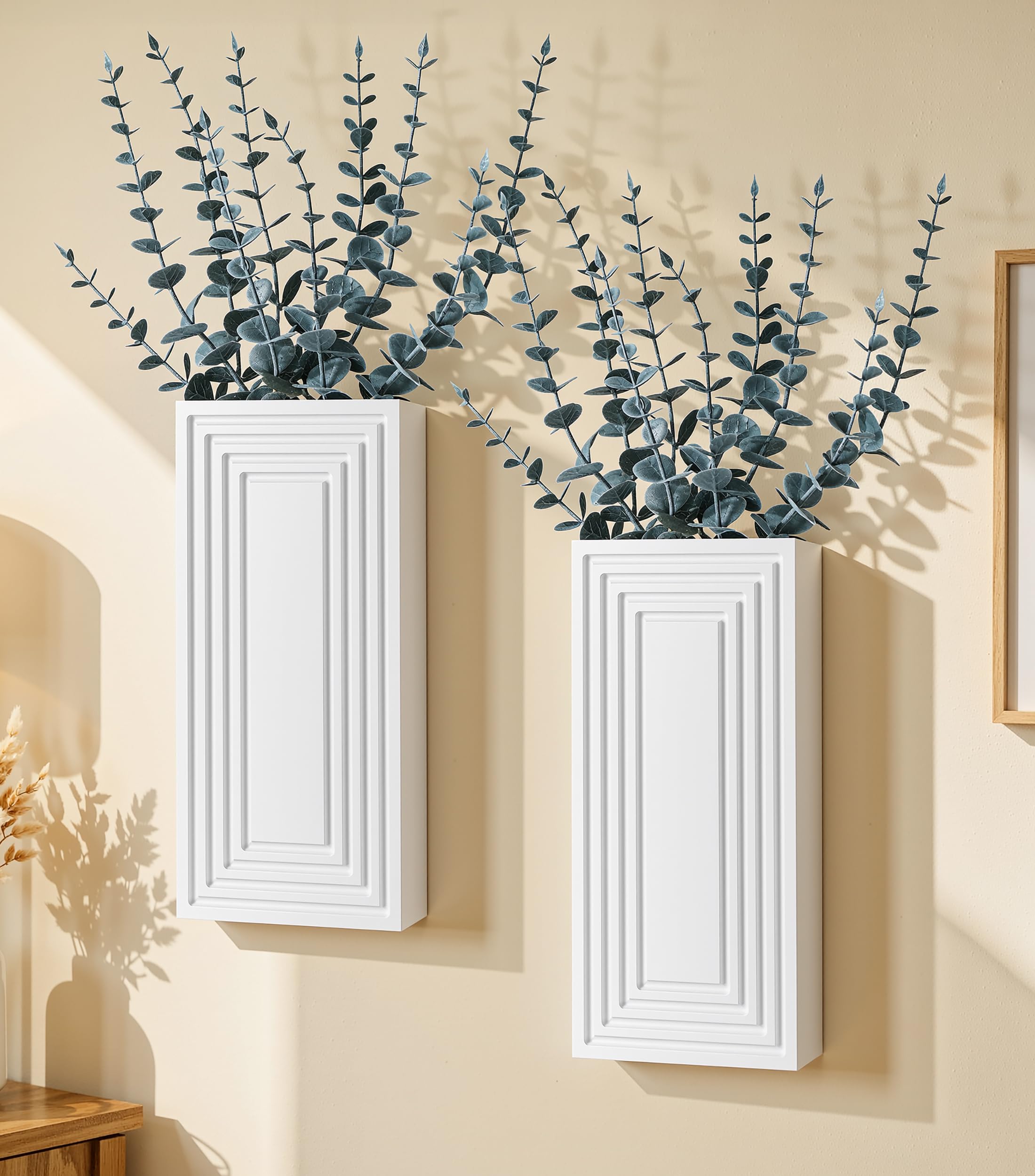 FancyPlus front view of two white wood hanging vases with eucalyptus showing ready-to-hang benefit