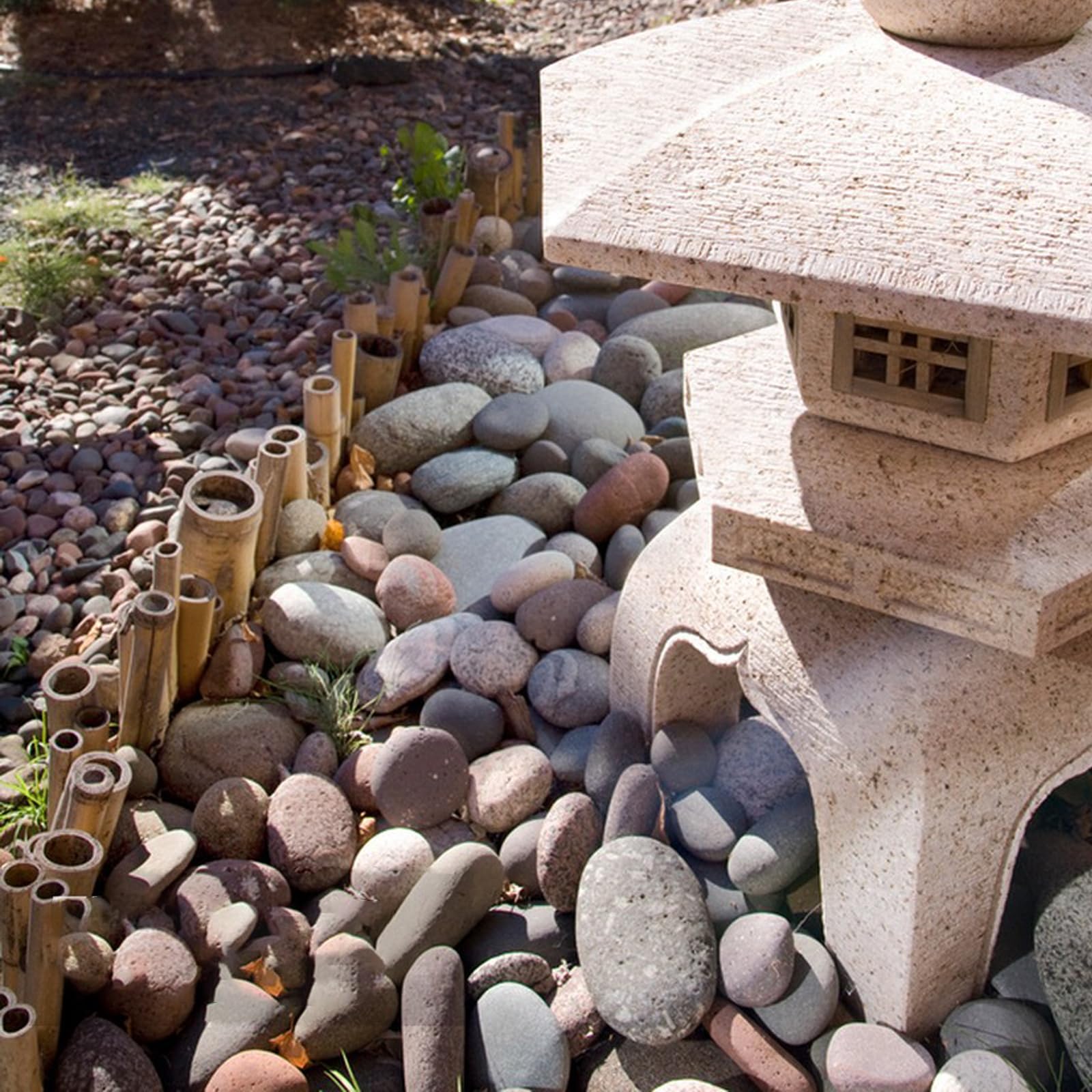 FANTIAN stones installed along garden walkway creating low-maintenance edging