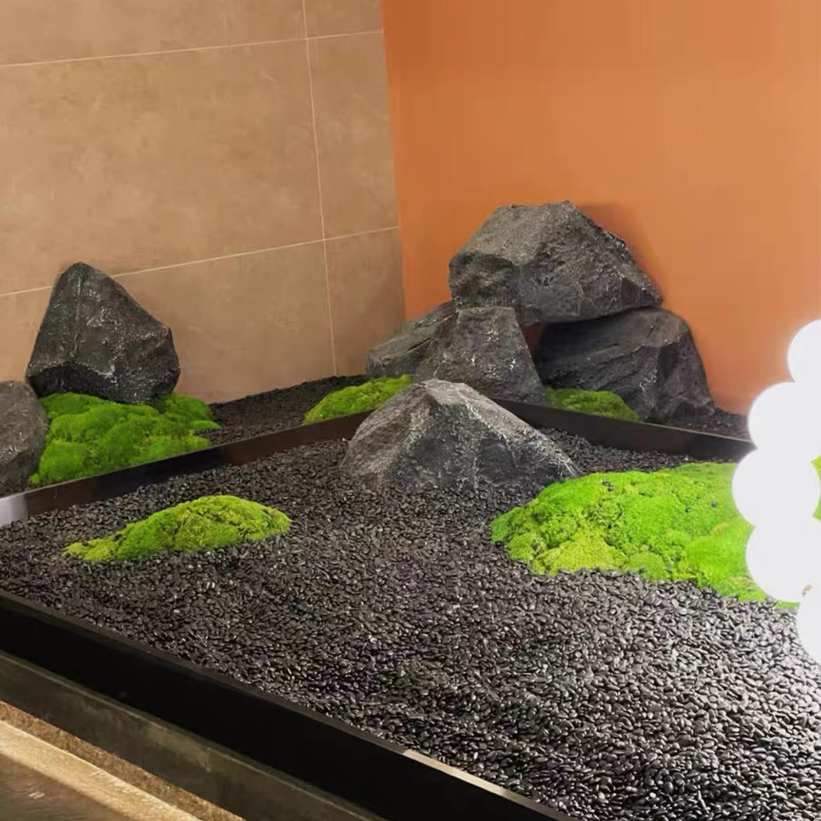 FANTIAN black stones edging a garden path for low-maintenance landscaping