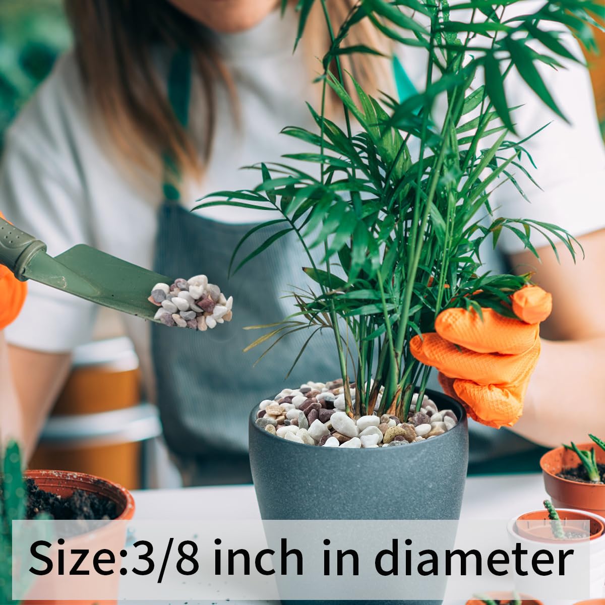 FANTIAN size comparison with hand to show 3/8-inch pebble scale and coverage