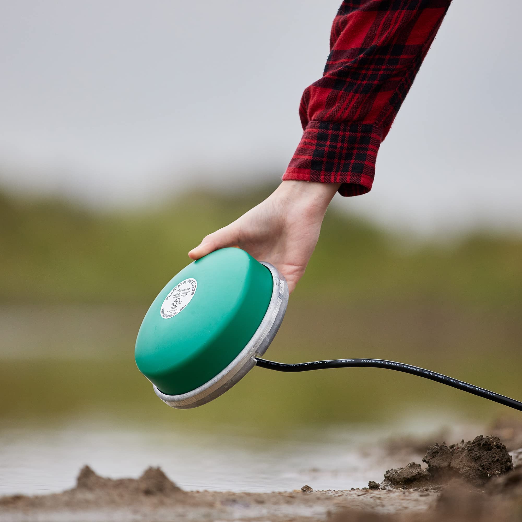 Farm Innovators floating in backyard pond demonstrating easy installation benefit