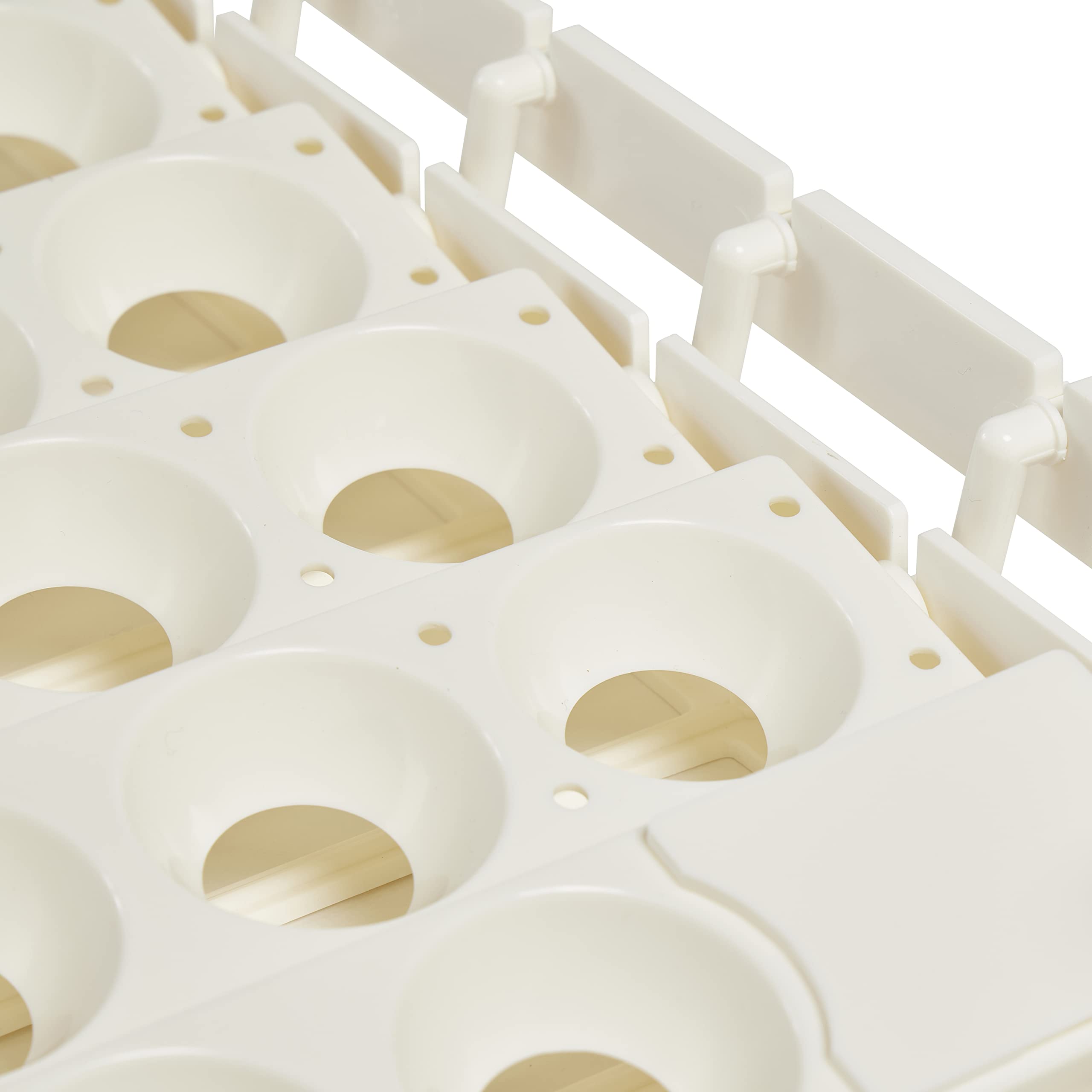 Farm Innovators removable rail snapped out for quick cleaning and maintenance