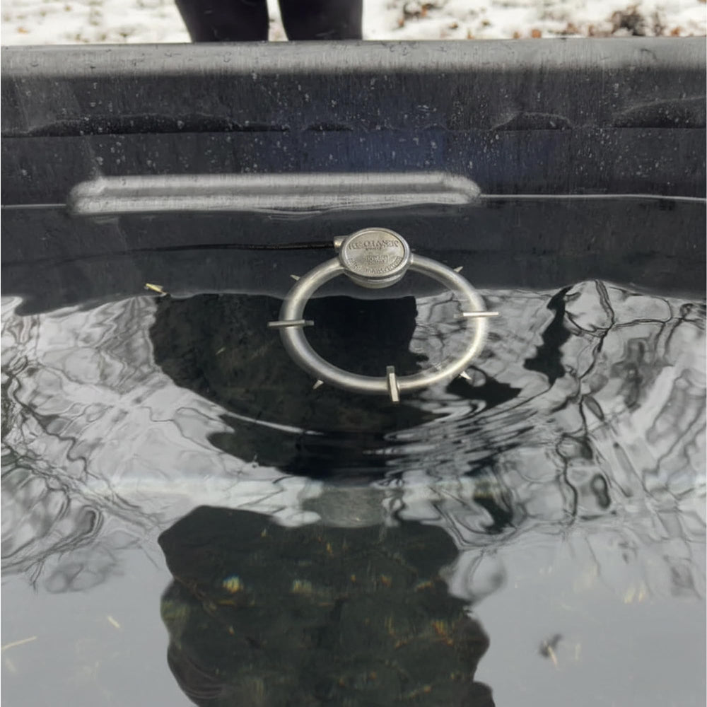 Farm Innovators heater beside 5-gallon bucket showing correct size and easy fit