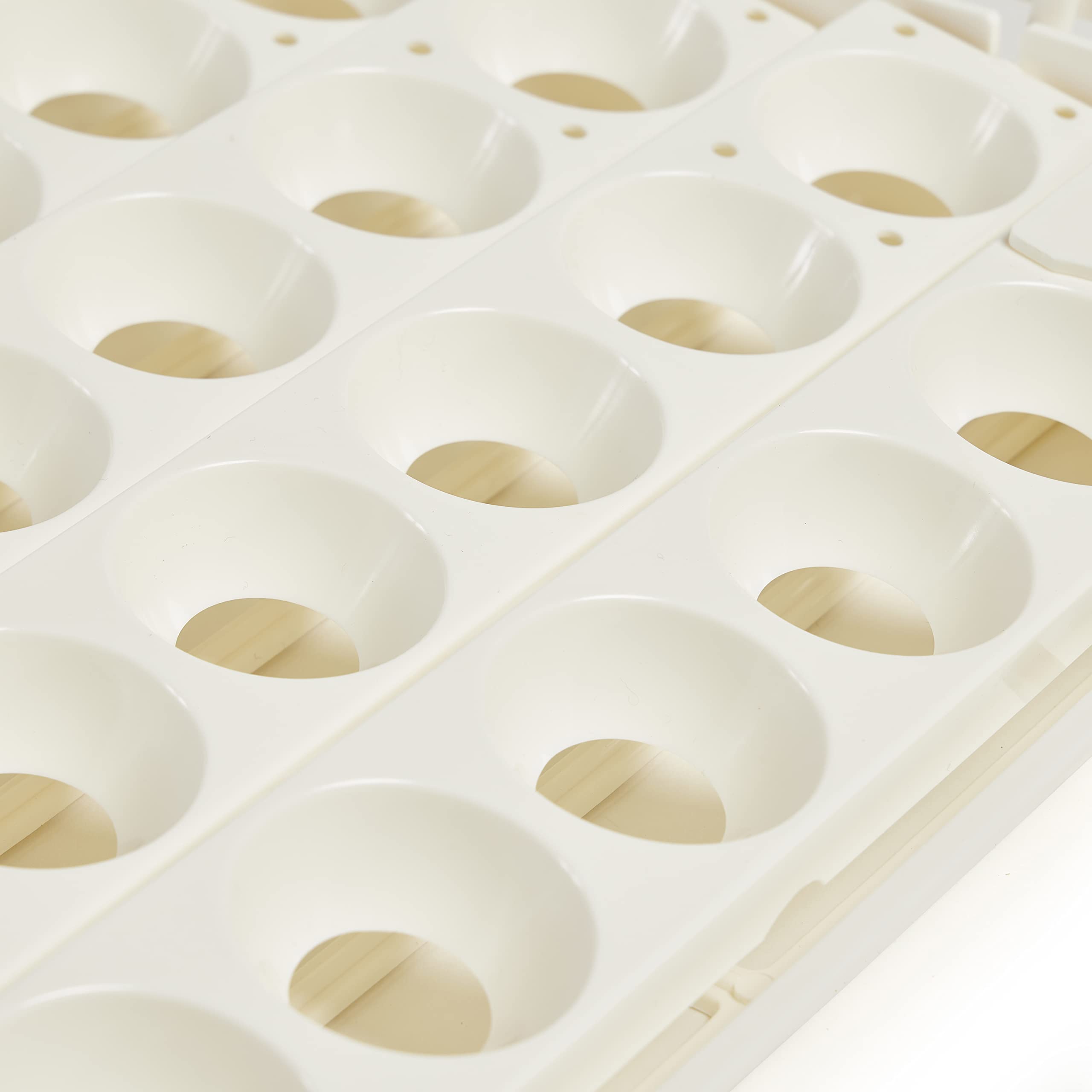 Farm Innovators egg turner loaded with eggs demonstrating operation in use