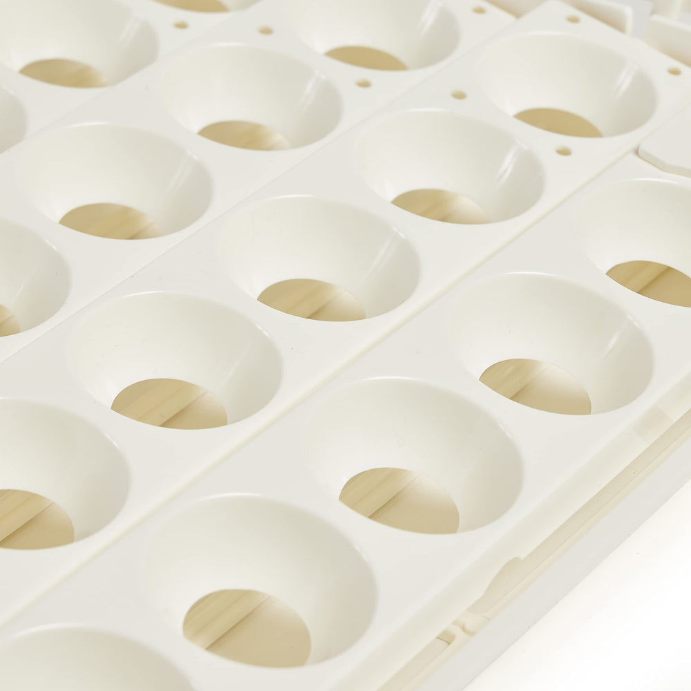 Farm Innovators egg turner loaded with eggs demonstrating operation in use
