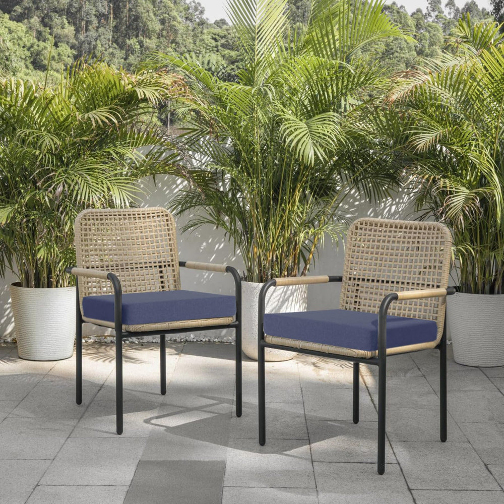 Favofamilie cushion placed on rattan patio chair illustrating added comfort outdoors