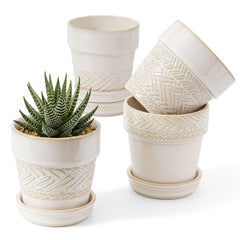 Fayoula front view of four pots showing patterns and neat grouping for display