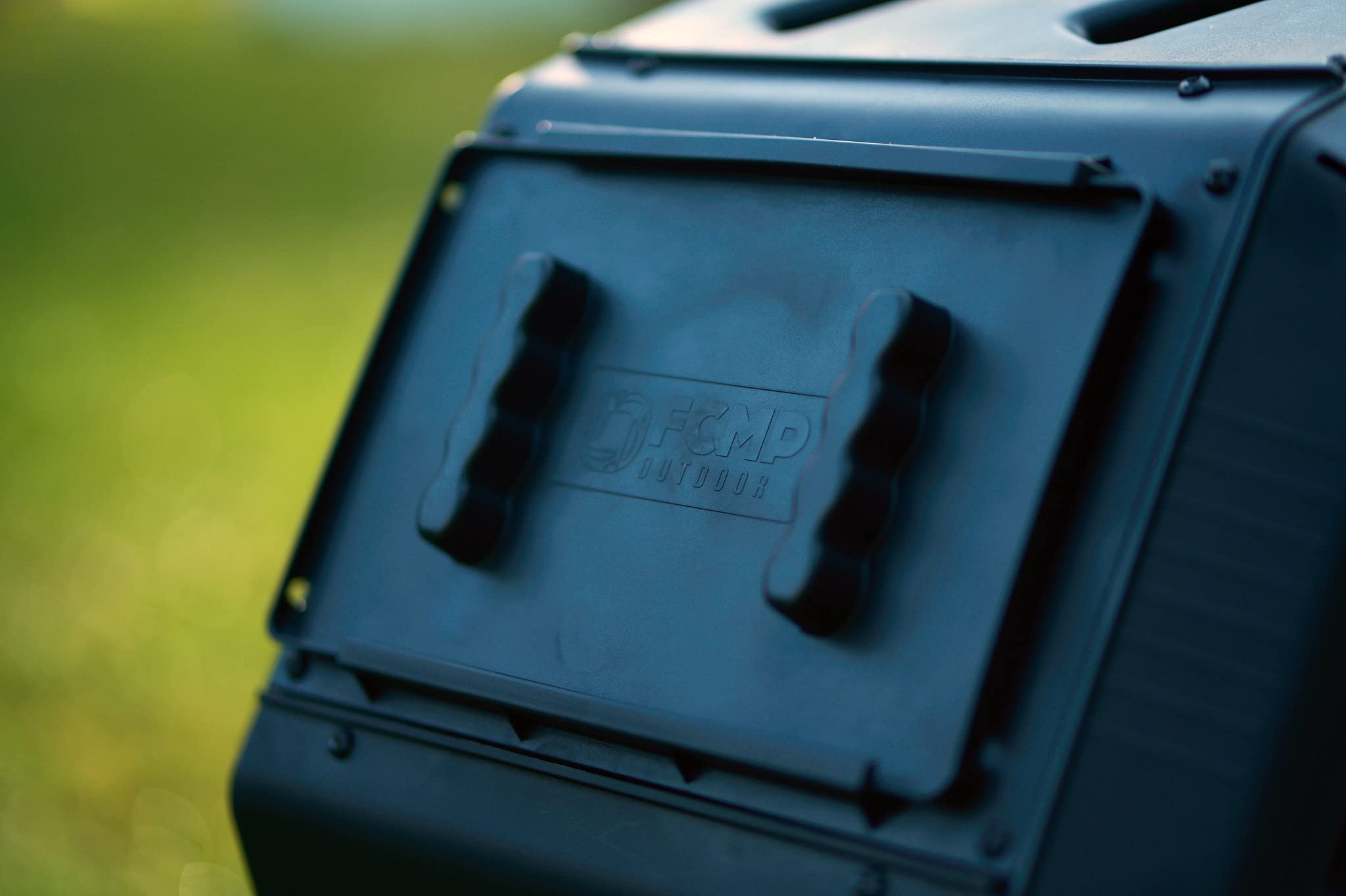 FCMP Outdoor IM2000 being rotated by hand showing ergonomic handholds and effortless turning benefit