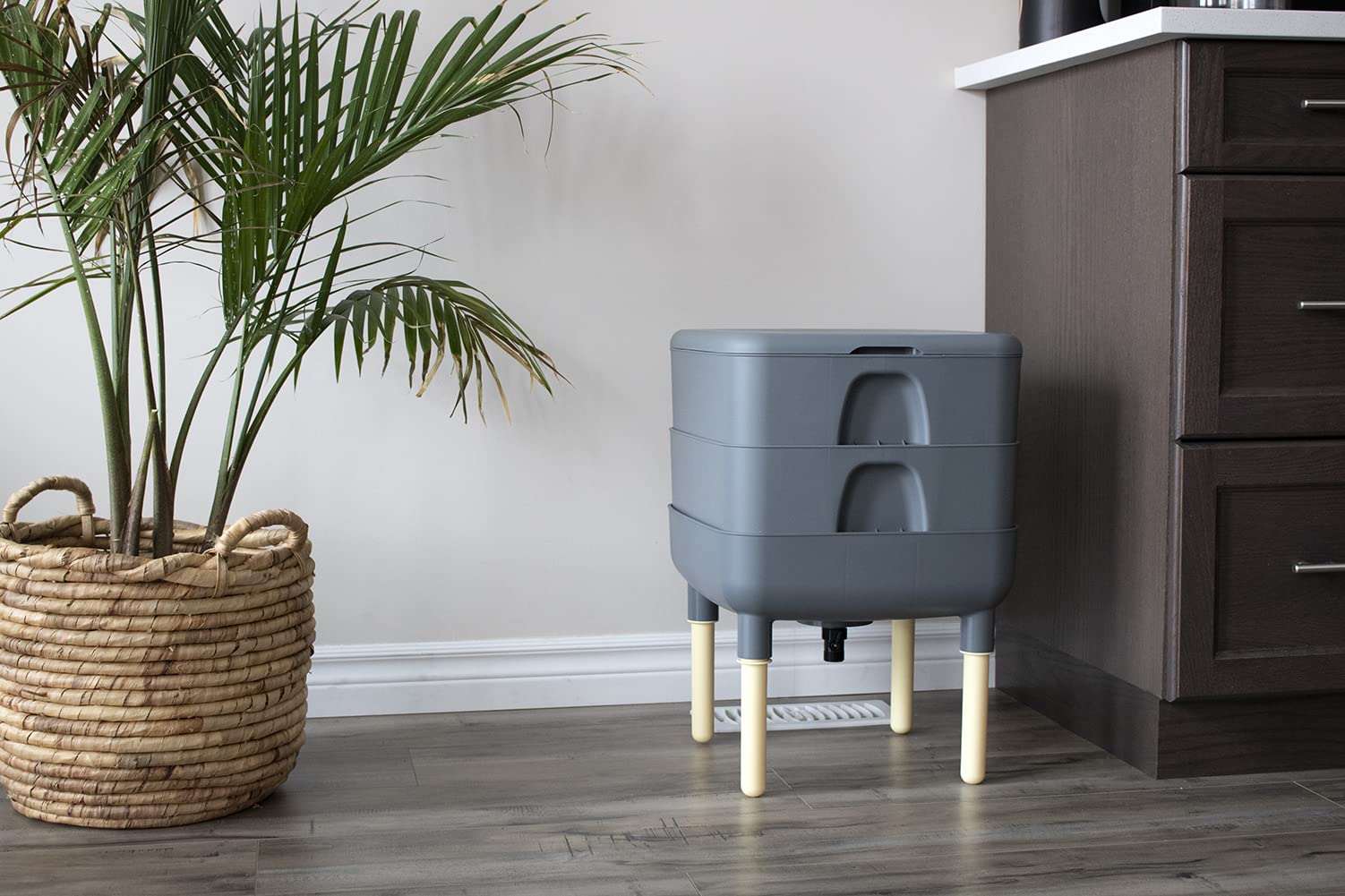 FCMP Outdoor lifestyle shot in kitchen showing discreet indoor composting convenience