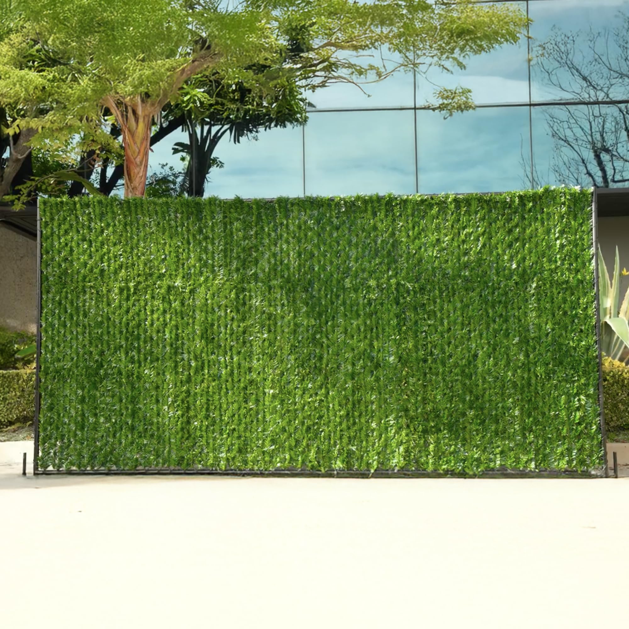 Fenpro close-up of pine-needle PVC texture highlighting dense coverage