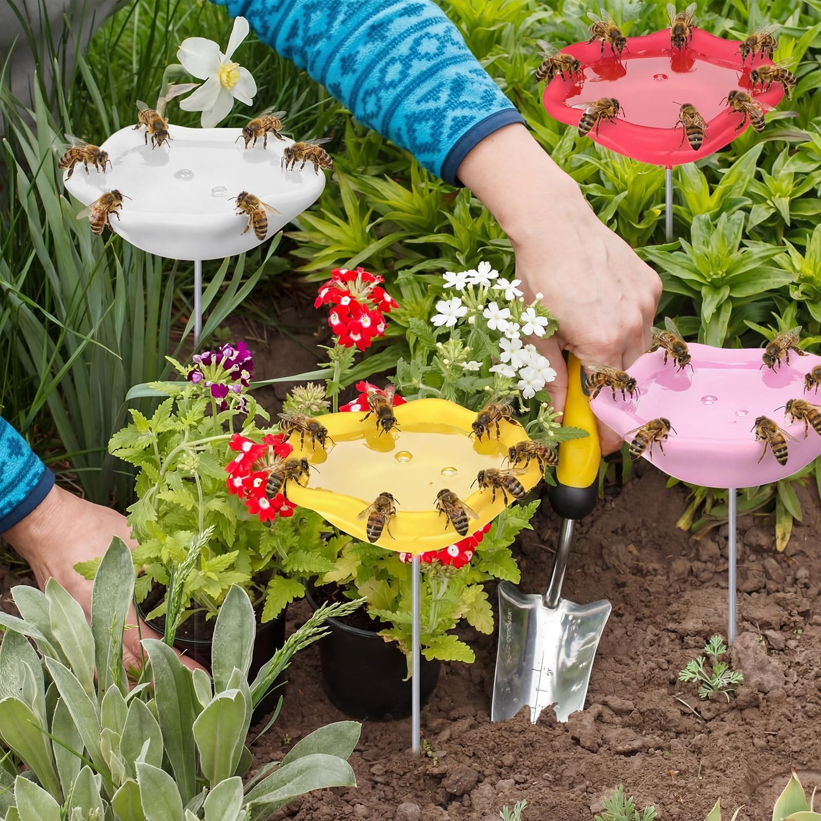 Ferrochef beside hand for size comparison showing compact garden fit