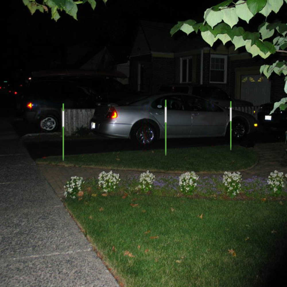 FiberMarker installed in snowy driveway marking edge for safer plowing