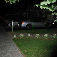 FiberMarker installed in snowy driveway marking edge for safer plowing