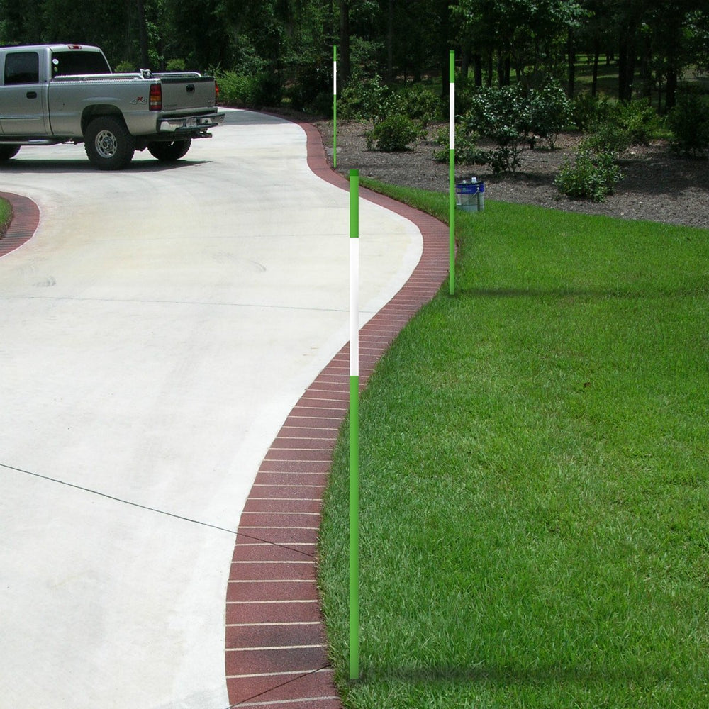 FiberMarker poles framing grass around a mailbox to prevent vehicle damage
