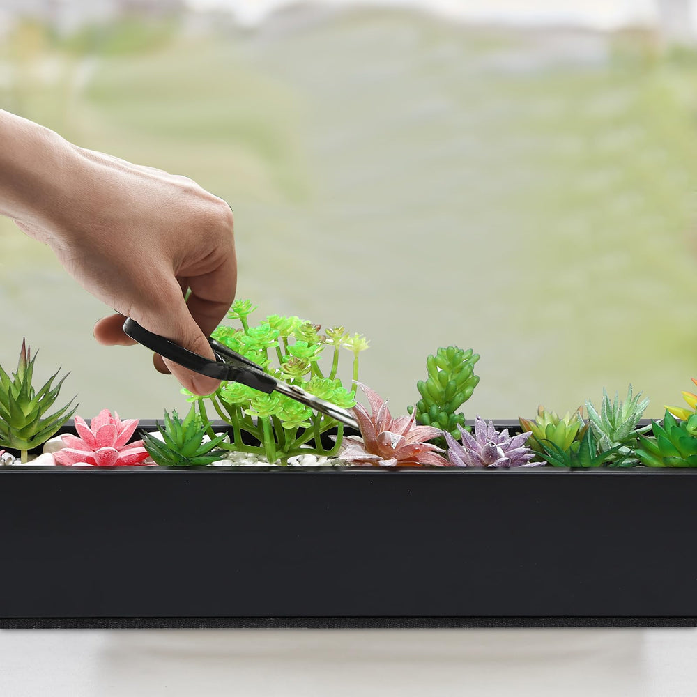 FillTouch planter on a windowsill with succulents providing compact greenery solution