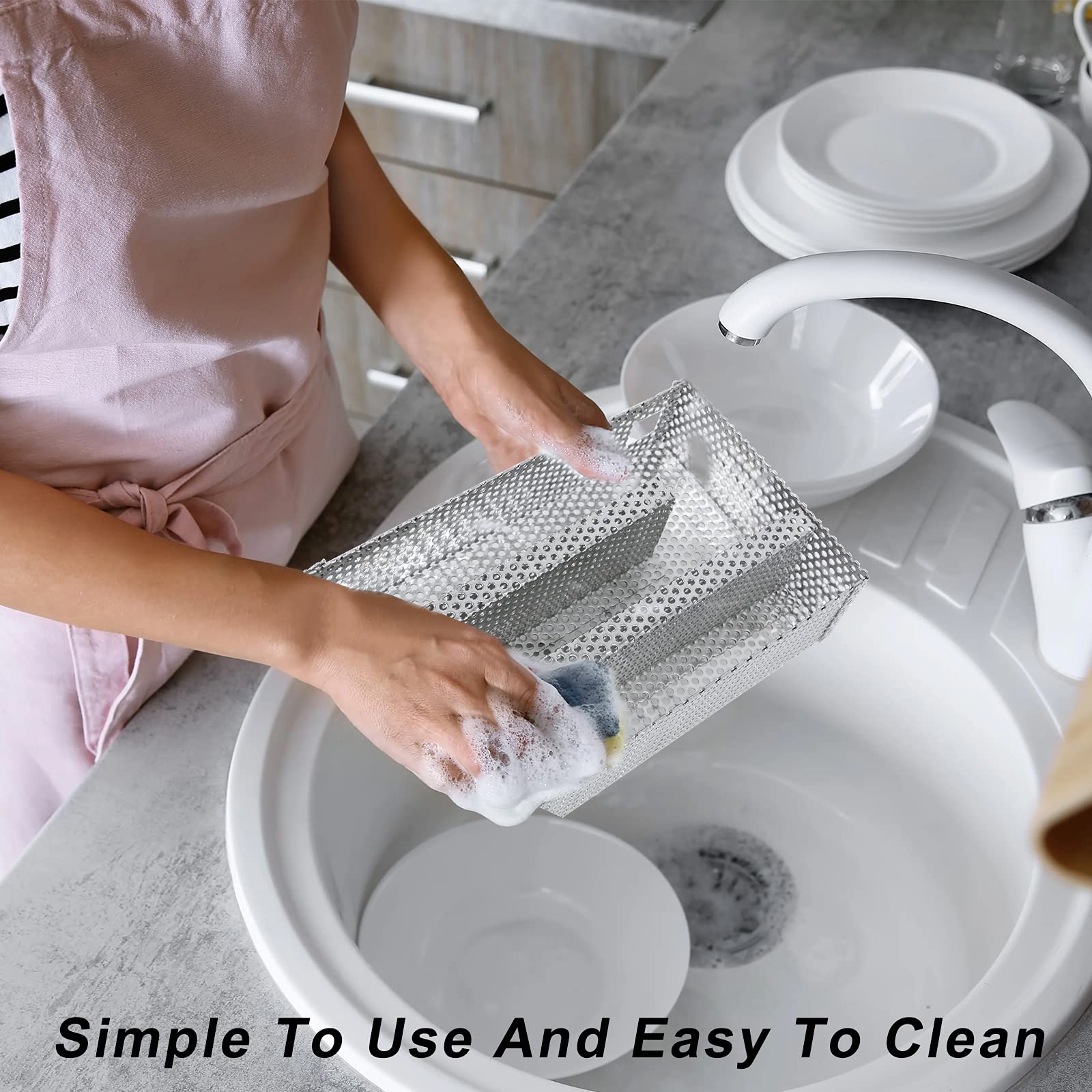 Finderomend tray after use with cooled ash demonstrating simple empty-and-rinse cleanup