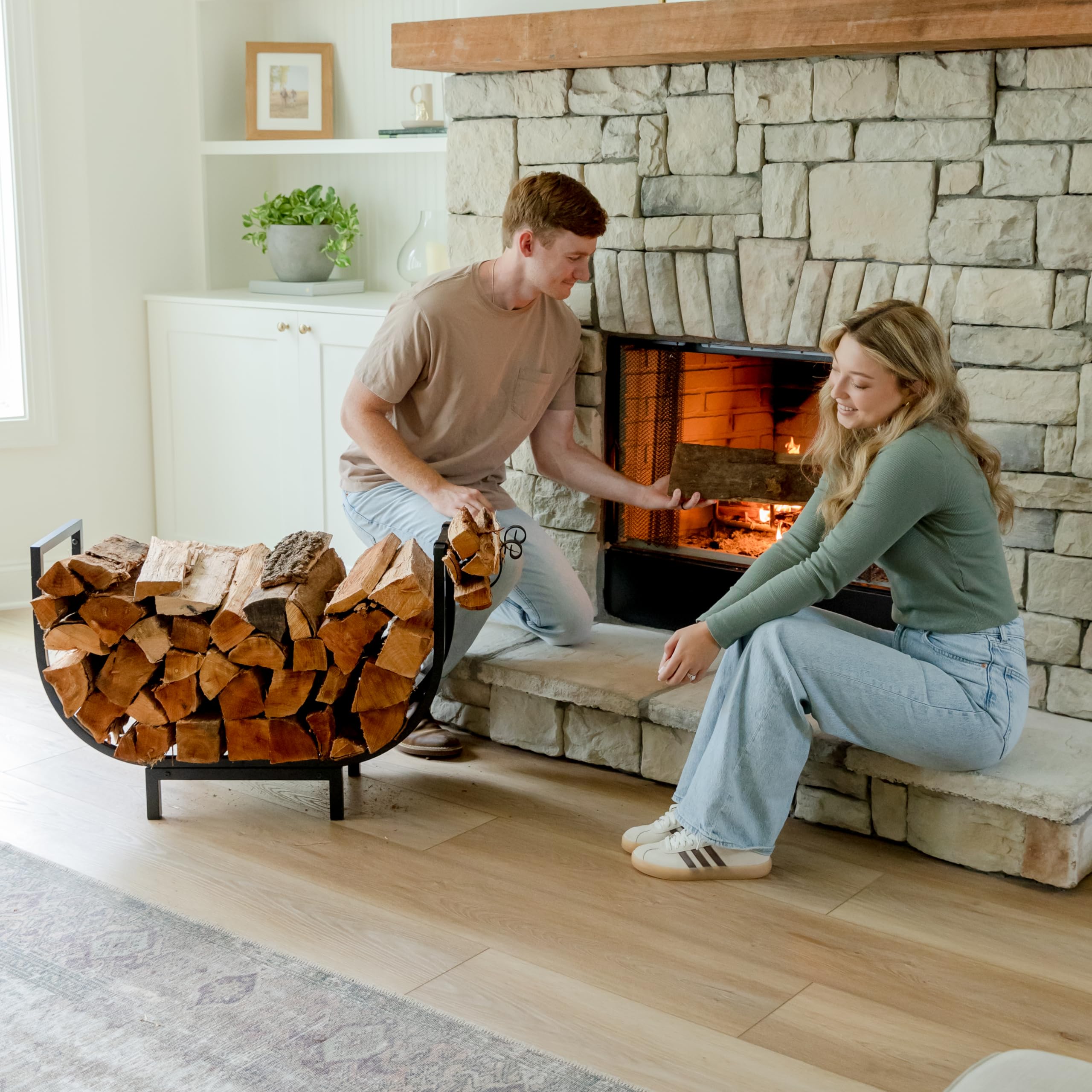 FireProof Pros log rack on a patio beside a fire pit creating an inviting outdoor atmosphere