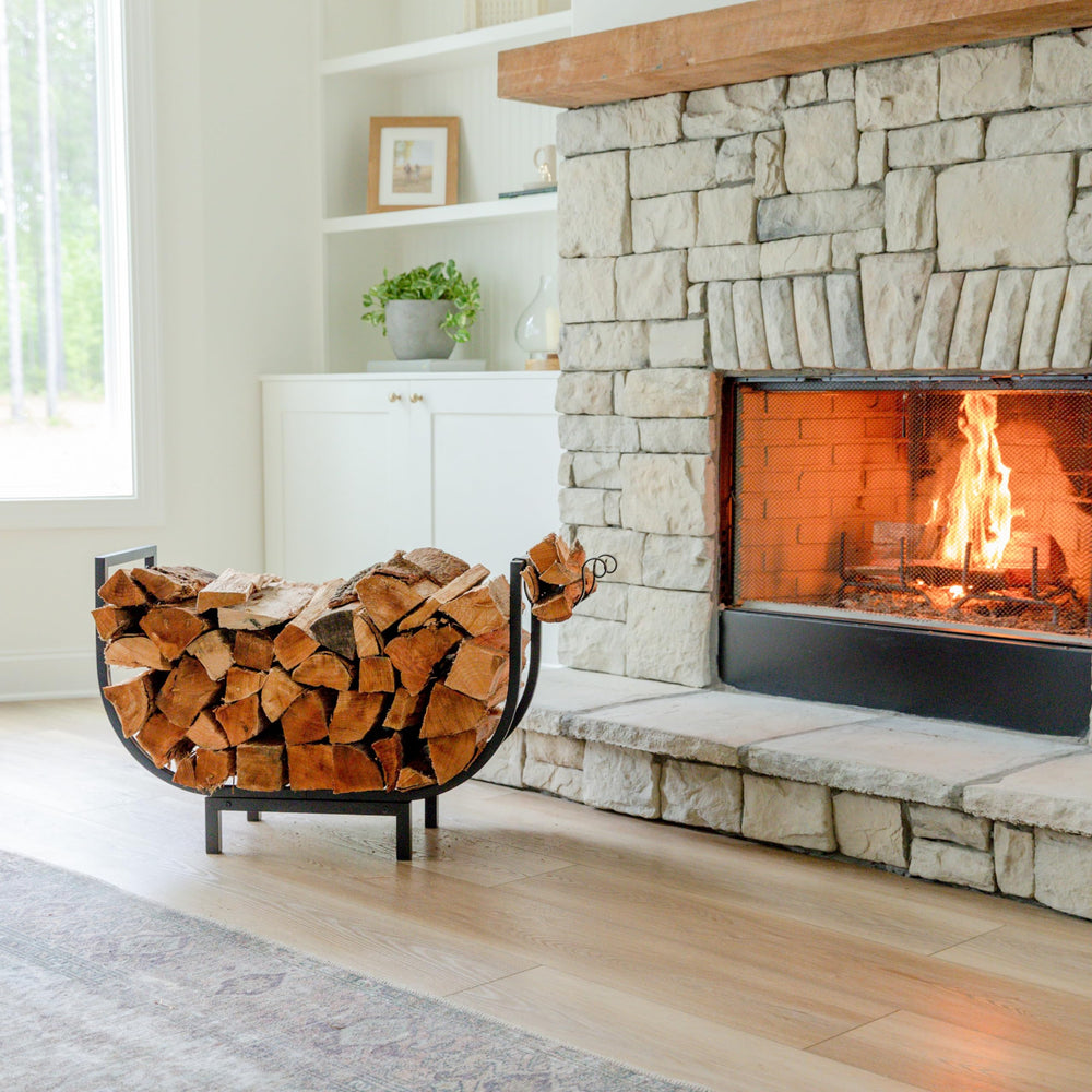 FireProof Pros raised base with rubber feet protecting floors and improving airflow to logs