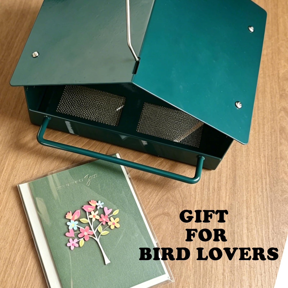 Firmlly feeder held in hand showing compact size and easy placement