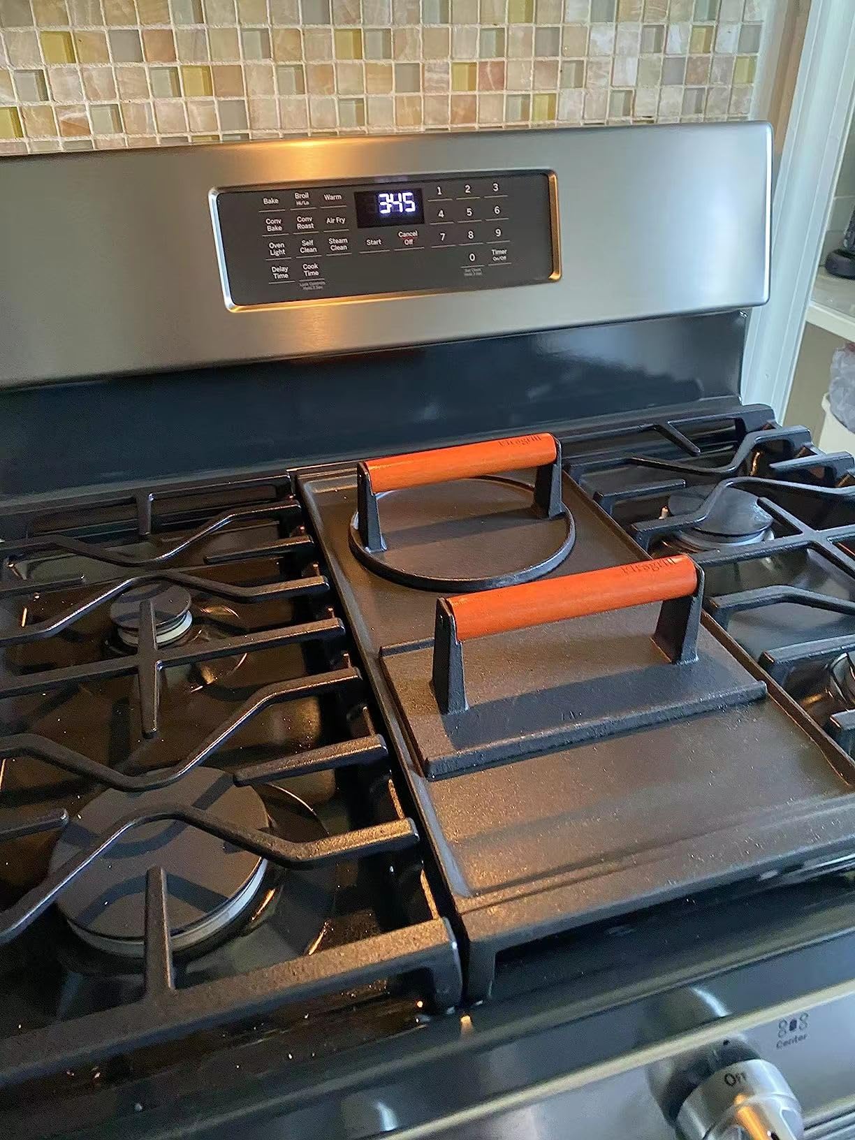 Firsgrill press next to ruler showing dimensions for accurate size selection